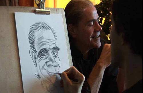 Caricaturiste dessinant un portrait lors d'un événement en direct.